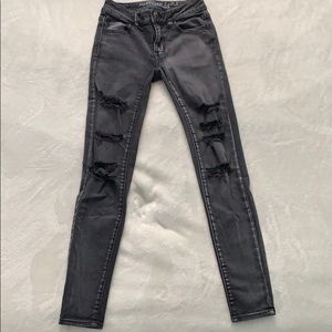 Black ripped American Eagle jeggings